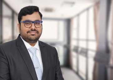 Harshal Sutaria, Director <br> Tax and Regulatory